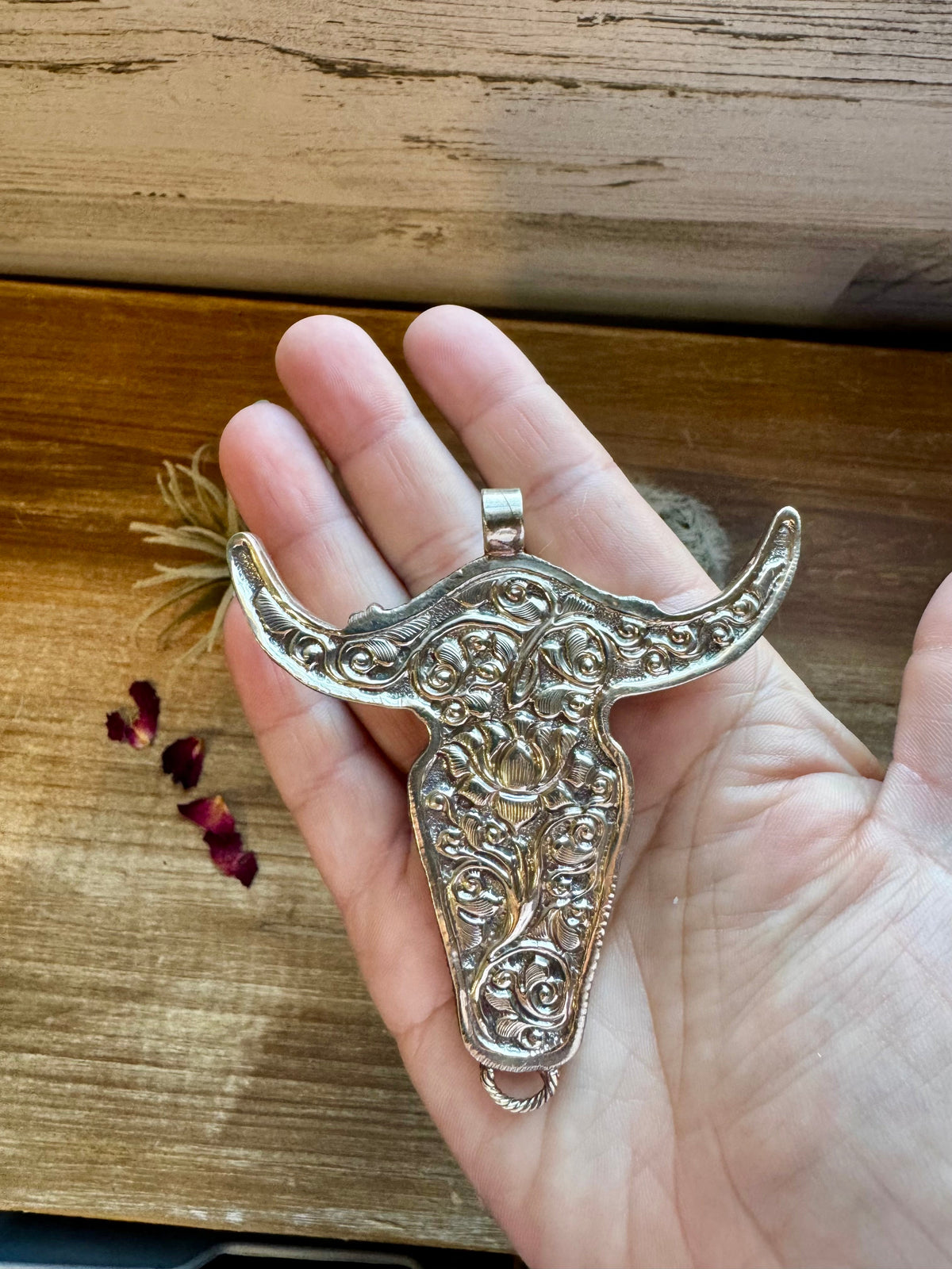 Big Antler longhorn with turquoise pendant